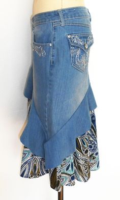 a mannequin wearing a skirt made out of jeans