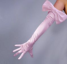 Iconic satin long bridal gloves with big bow, these are 58cm long gloves and comes with a bow. Wedding ideas: Match these fashion-forward gloves with a white cocktail dress to complete your wedding reception outfit. You will definitely look stunning! Aim for a more glamorous style and wear them to your bachelorette party. Spice up your wedding reception outfit or wear them with your favorite Evening dress, Wedding gown or Party costumes. Also perfect for hen-do Party ! Fabric: Satin  Color Choices: 1) Pink, 2) White, 3) Black. Size: One size.  ** you can measure the size of your palm, if the circumference is within 21cm, they fit you. The model in the image is 175cm tall and her palm circumference is 19cm. ** Pls see the last image, it shows the palm measurement method. + We offer free shi Cheap Pink Costume Accessories, Cheap Pink Novelty Costume Accessories, Cheap Pink Halloween Costume Accessories, Gown Gloves, Satin Colors, Party Gloves, V Model, Costume Gloves, Evening Gloves