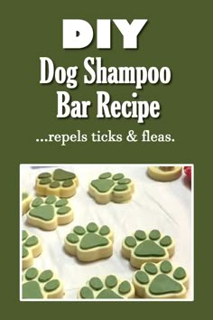 dog shampoo bar recipe with green paw prints on it and the words, diy dog shampoo bar recipe repels tricks & fleas