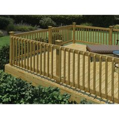 a wooden deck with table and chairs on it