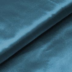 a close up shot of a blue velvet fabric