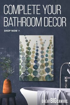 a bathtub sitting next to a painting on the wall with text overlay that reads complete your bathroom decor shop now