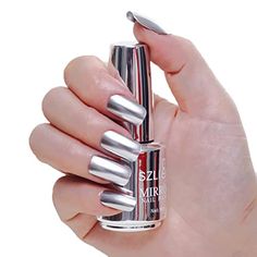 PRICES MAY VARY. 【Metallic Chrome Mirror Effect】Fantastic and super bright nail polish for you. Allow you to create beautiful nail designs in short time. Charming metallic mirror effect, perfect for party and club. 【Suggest】 To ensure the effect, it is recommended to use a layer of primer first to make the nail surface smooth. Apply the mirror polish 2-3 minutes after the primer is painted. It is recommended to apply 2-3 coats. Finally, apply a bright finish on the surface. It can help keep it l Mirror Effect Nail Polish, Mirror Nail Polish, Rose Gold Nail Polish, Gold Chrome Nails, Silver Nail Polish, Chrome Nail Polish, Metallic Nail Art, Metallic Nail, Metallic Nail Polish