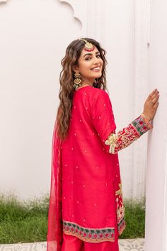 Buy Pakistani Reddish Pink Kameez Trouser and Dupatta Dress, emblazoned with graceful Embroidery, Dabka, Sequins, and Naqshi. Custom Sizes. Fast Shipping. Pink Kameez, Dupatta Dress, Dress Name, Raw Silk Fabric, Dress Design Patterns, Elegant Attire, Pink Shade, Pink Fabric, Raw Silk