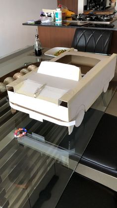 an open box sitting on top of a glass table