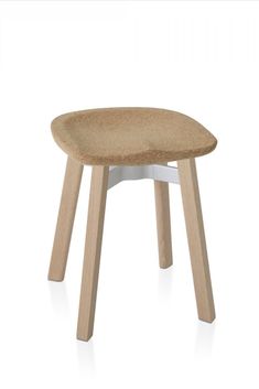 the stool is made out of wood and white