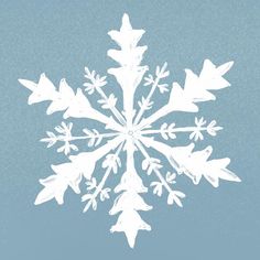 a white snowflake on a blue background