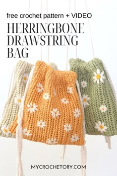 three crochet drawstring bags hanging from strings