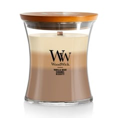 the woodwick candle is shown in front of a white background