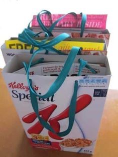 an open box of cereal sitting on top of a table