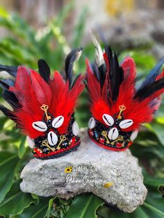 Eleggua inspired mini crown with cowrie shells, 3 keys, black and red feathers, and jewels. Each item is respectfully made with the highest quality materials. Please note: All items are made to order and ship within 4-6 weeks! Style may slightly vary due to material availability. For custom color or style, you may reach out ... Djembe Drum, Mini Crown, Carnival Theme, Cowrie Shells, Carnival Themes, Red Feather, Cow Bell, Cowrie Shell