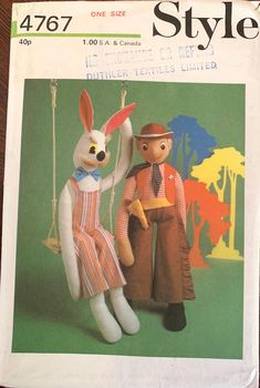 an image of two rabbits on the cover of a sewing pattern for children's clothing