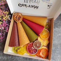 a box filled with different types of fruit