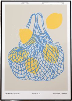 a blue and yellow bag with lemons on it in front of a white background