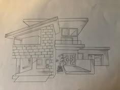 a pencil drawing of a house on paper