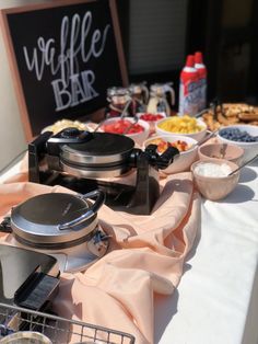 a buffet table with food and drinks on it