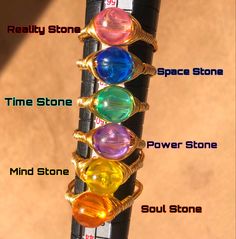 the seven chakra stones are arranged in a row on top of a bike tire