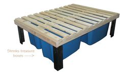 the bed frame is made out of wood and has blue plastic bins underneath it