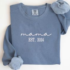 "Comfort Colors® Custom Embroidered Mama Est 2024 Sweatshirt, Mama Est Sweatshirt With Kid Name, Mama Crewneck Embroidered, Mom And Son Gift PERFECT GIFT FOR MOM CUSTOM EMBROIDERED MAMA EST SWEATSHIRT WITH KIDS NAMES 🔎 Looking for the perfect gift for your mom? We've got just the thing: a custom embroidered Mama sweatshirt with her kids' names. ➤This thoughtful and personalized gift shows your mom how much she means to you and your siblings. The sweatshirt will feature the names of all her kids Mama Crewneck, Mom And Son, Son Gift, Custom Sweatshirts, Gifts For Your Mom, Comfort Color, Perfect Gift For Mom