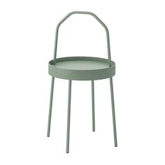 a green metal chair with a handle on it's backrest and legs, against a white background