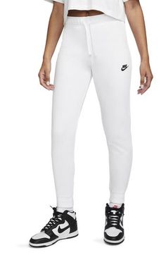 Lightweight knit joggers are cut in a versatile, slim profile and make racing to the finish line or grocery store exceptionally comfortable. 80% cotton, 20% polyester Machine wash, tumble dry Imported Model stats: 5'10" height, 32" bust, 25" waist, 36" hip. Model is wearing size S. Nike Club Fleece, Fleece Outfit, Nike Sportswear Club Fleece, Knit Joggers, Slim Joggers, Adidas Tracksuit, Nike Tech, Shorts With Tights, For A Reason