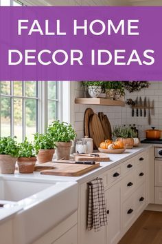 a kitchen filled with lots of white cabinets and counter top space next to a window