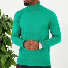 Slip into comfortable designer stylings in this handsome long-sleeved turtleneck with a traditional ribbed cuff design for versatility when paired with casual or semi-formal outfits.