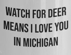 a coffee mug with the words watch for deer means i love you in michigan