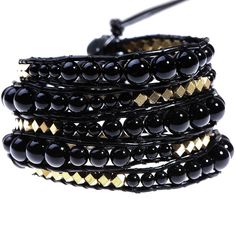 PRICES MAY VARY. HANDMADE - Each of these Boho Style Women’s bracelets is designed and uniquely handcrafted using 3 different sizes of natural black onyx stone for a fierce and eye-catching look. MATERIAL - Our handmade beaded wrap bracelet is made of black onyx semi-precious gemstones, copper nuggets, stainless steel button, and genuine leather. Nickel and lead free. PRODUCT SPECIFICATIONS - This adjustable multi-layer bracelet measures 37 inches in length, with stone beads ranging between 4mm, Handmade Onyx Black Bracelets, Bohemian Adjustable Black Beads Wrap Bracelet, Black Onyx Stretch Bracelet For Spiritual Style, Black Agate Bohemian Bracelets, Black Onyx Spiritual Stretch Bracelet, Stone Wrapping, Black Onyx Stone, Beaded Wrap Bracelets, Layered Bracelets