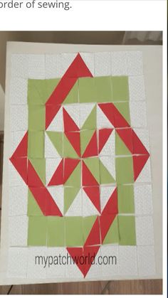 a piece of paper that has been made into a quilt