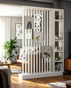 a living room filled with furniture and a flat screen tv on top of a wooden floor