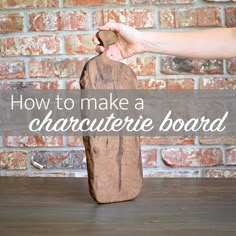 a person holding a wooden skateboard with the words how to make a charlotte board