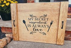 a wooden box with the words my secret ingredient is always love