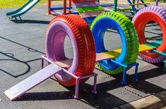 colorful children's play equipment in an amusement park stock photo - image 399782