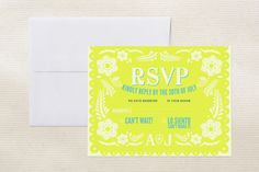 a yellow and white wedding card with the word rsvp printed on it, next to an envelope