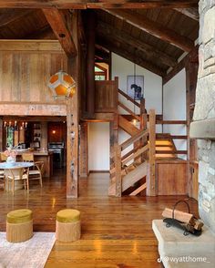 a living room filled with furniture and a fire place