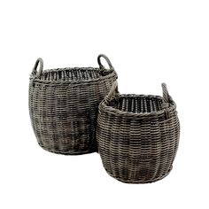 two wicker baskets sitting next to each other