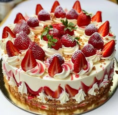 there is a cake with strawberries on it