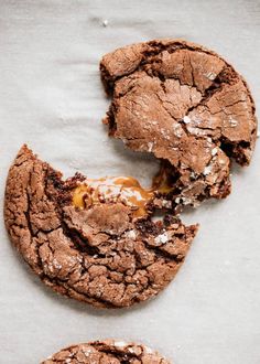 two chocolate cookies that have been cut in half