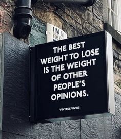 a sign that reads the best weight to lose is the weight of other people's opinions