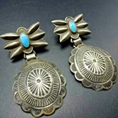 "VINTAGE NAVAJO EARRINGS DESCRIPTION: These fabulous earrings are repurposed from parts of an old concho. The stampwork is phenomenal! These earrings will be a cherished addition to your collection of quality vintage Native American jewelry. MEASUREMENTS: Earrings measure 2 1/4\" x 1 1/4\" WEIGHT: 23.9 grams SIGNED: no STERLING: unmarked, verified sterling silver" Vintage Sterling Silver Dangle Jewelry, Vintage One-of-a-kind Dangle Jewelry, Antique Dangle Earrings From Vintage Collection, Vintage Sterling Silver Dangle Plug Earrings, Bohemian Drop Earrings For Vintage Collection, Antique Dangle Earrings For Vintage Collection, Bohemian Vintage Drop Earrings, Vintage Sterling Silver Drop Earrings, Vintage Sterling Silver Drop Plug Earrings