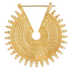 a gold necklace with an intricate design on the front and back of it, hanging from a