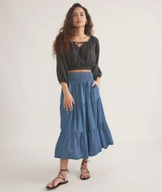 Corinne Chambray Maxi Skirt – Marine Layer Casual Voluminous Maxi Skirt For Day Out, Chic Gathered Tiered Skirt, Long Gathered Skirt For Brunch, Flowy Full Skirt For Day Out, Chic Relaxed Fit Tiered Skirt, Chic Voluminous Tiered Skirt Bottoms, Chic Gathered Skirt For Brunch, Chic Full Maxi Skirt For Vacation, Flowy Full Skirt For Brunch