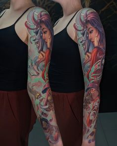 two women with tattoos on their arms