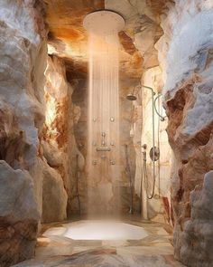 a shower in the middle of some rocks