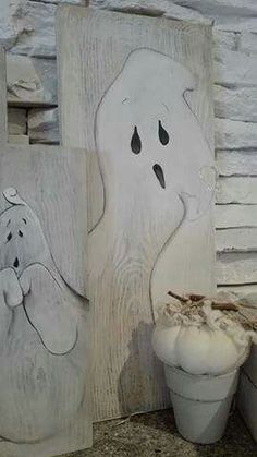 two ghost paintings sitting next to each other