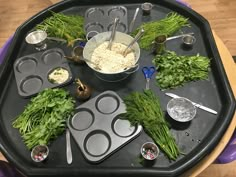 an assortment of ingredients on a tray ready to be made into muffin tins