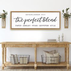 a wooden table with baskets on it in front of a sign that reads, the perfect blend