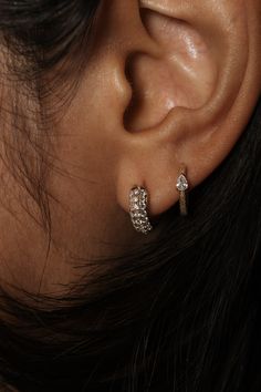 DETAILS Metal - 14k yellow or white gold Stone(s) - 0.54tcw Diamond Length - 12mm WHY WE LOVE IT Dome of diamonds. Need to bump up the sparkle of your earstack? Look no further! The Autumn earrings are dome style diamond pave huggies with major sparkle, featuring 0.54tcw of round diamonds! SHIPPING + RETURNS Learn about our Return + Exchange Policy here. LET'S CHAT! Don't see your size? Curious about something? Don't be shy, if you have any questions we would love to hear from you. Send us an em Mixed Metals Jewelry Style, Yellow Diamond Earring, Autumn Earrings, Piercing Inspo, Multiple Earrings, Diamond Huggie Earrings, Mixed Metal Jewelry, Simple Diamonds, Luxury Earrings