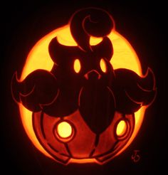 a carved pumpkin with an image of mickey mouse on it